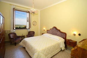 Отель Residenza Savonarola Luxury Apartment  Монтепульчано